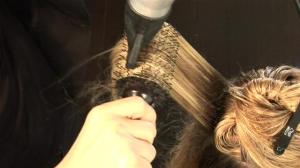 how-to-use-a-round-brush-to-curl-hair-2.WidePlayer